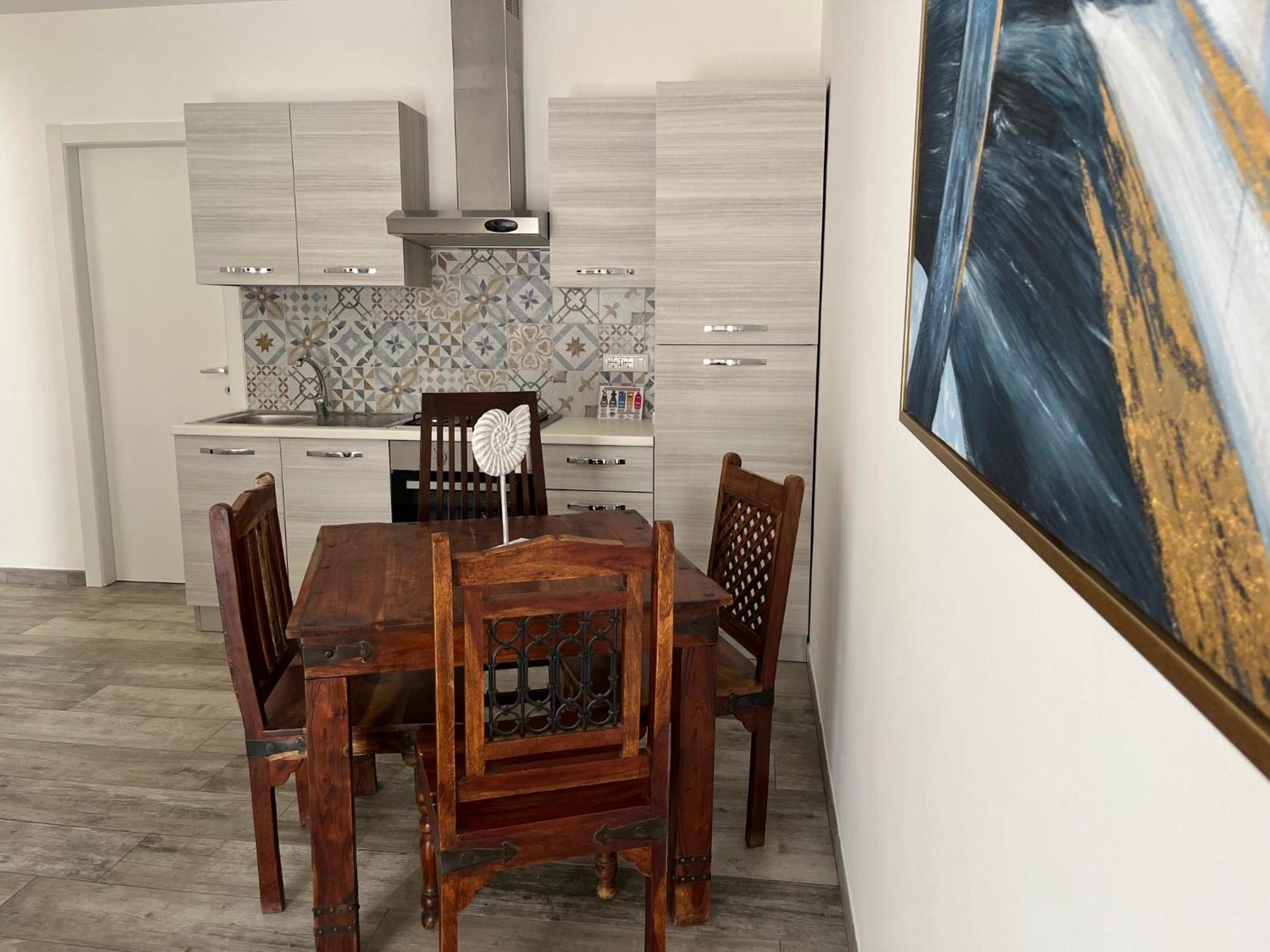 Kennedy Family Apts Alghero Rum bild